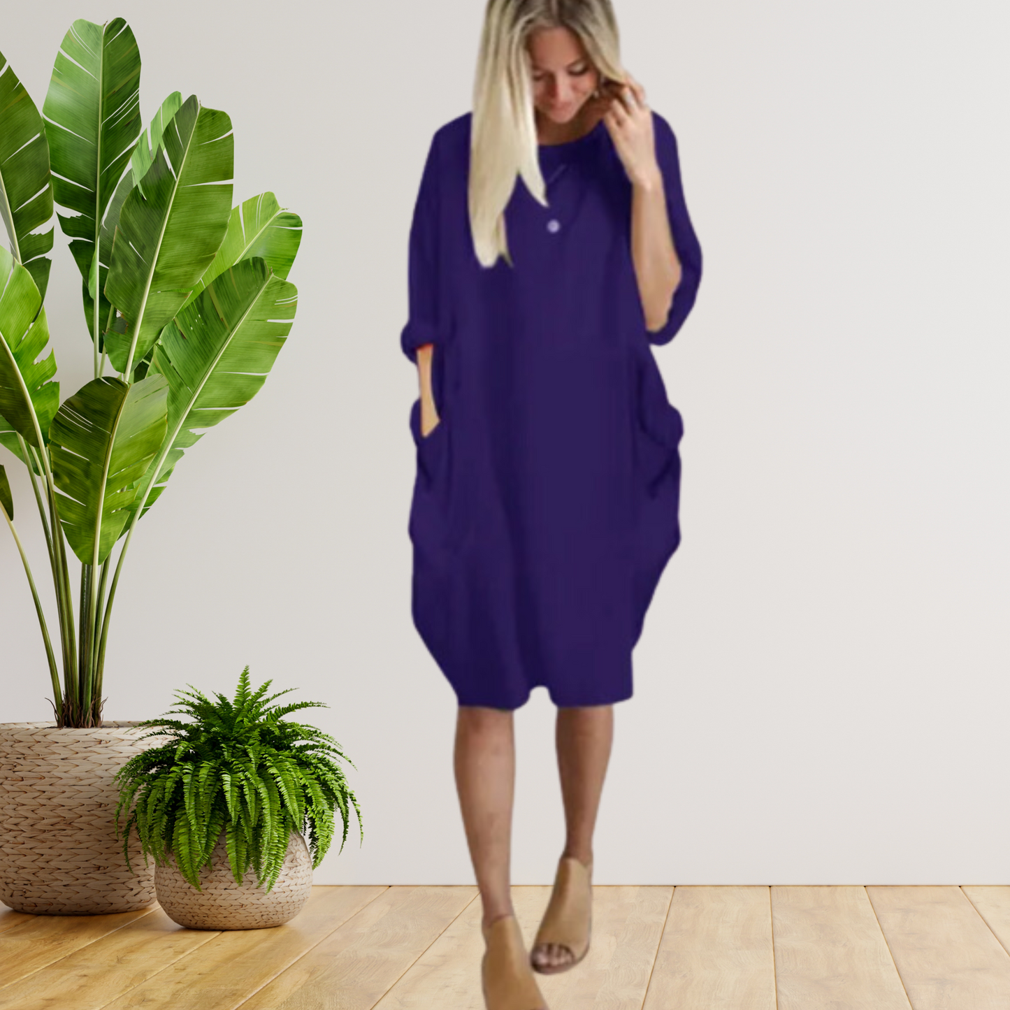 Langärmeliges lockeres Taschenkleid