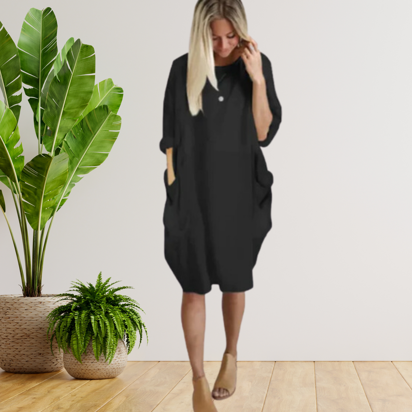 Langärmeliges lockeres Taschenkleid