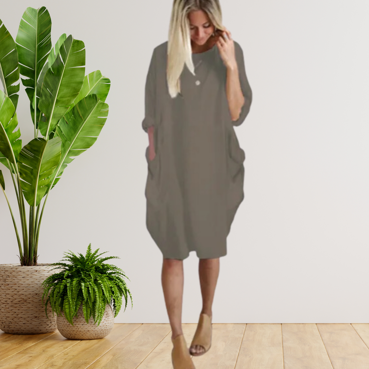 Langärmeliges lockeres Taschenkleid