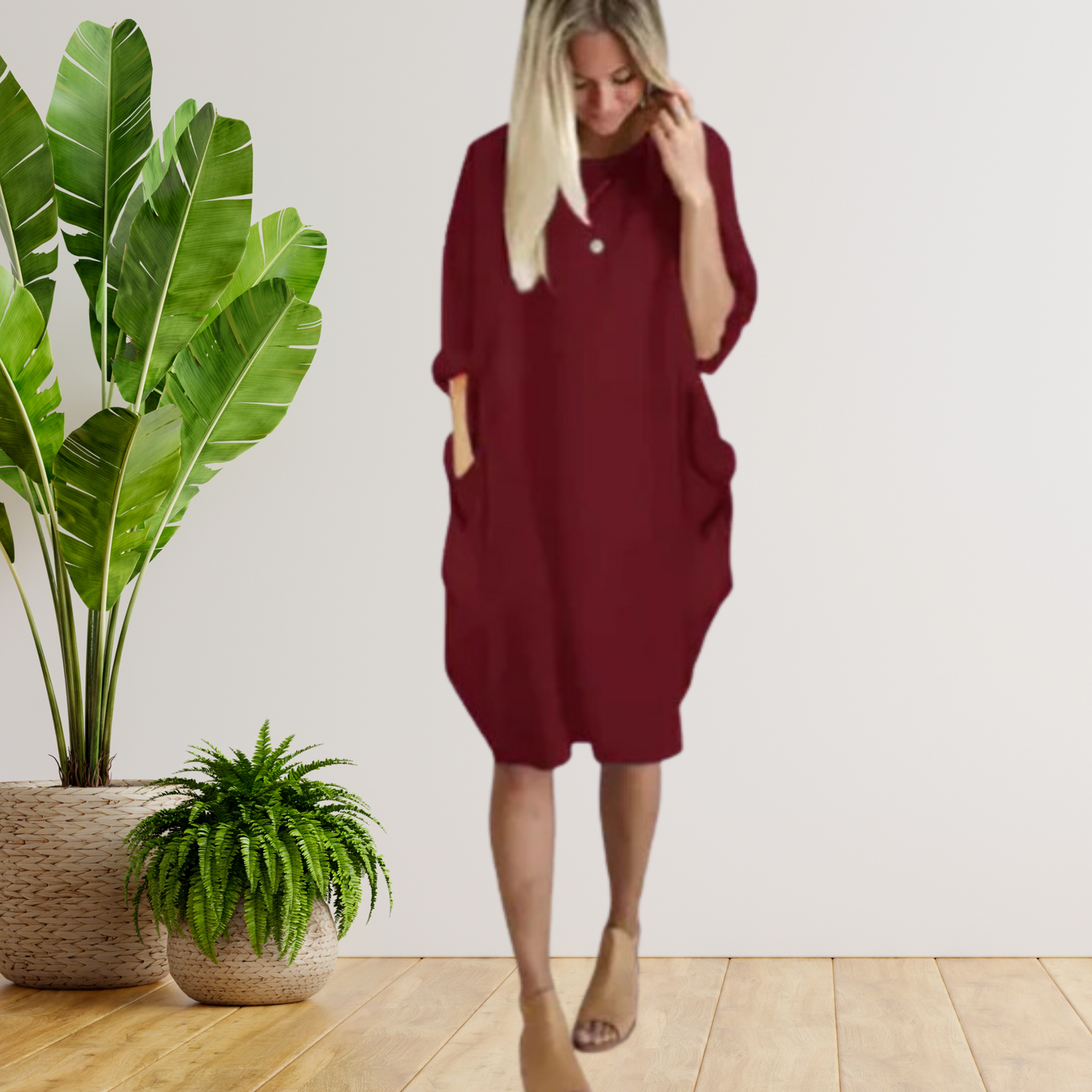 Langärmeliges lockeres Taschenkleid